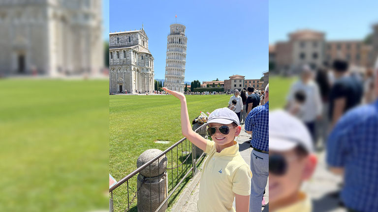 The author’s son with the Leaning Tower of Pisa, which was his must-see.